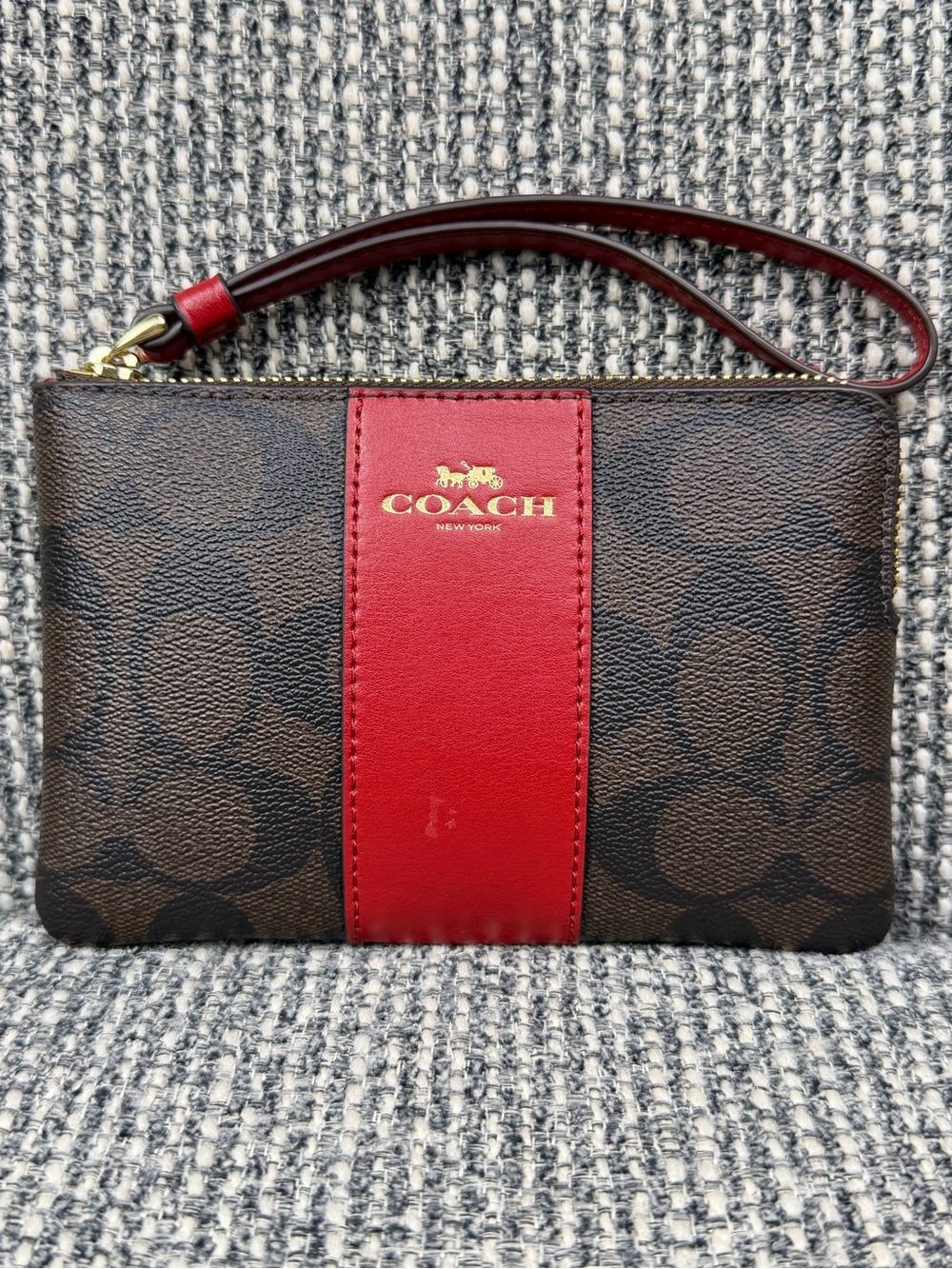 COACH Brown Signature Canvas Wristlet with Red Center Stripe